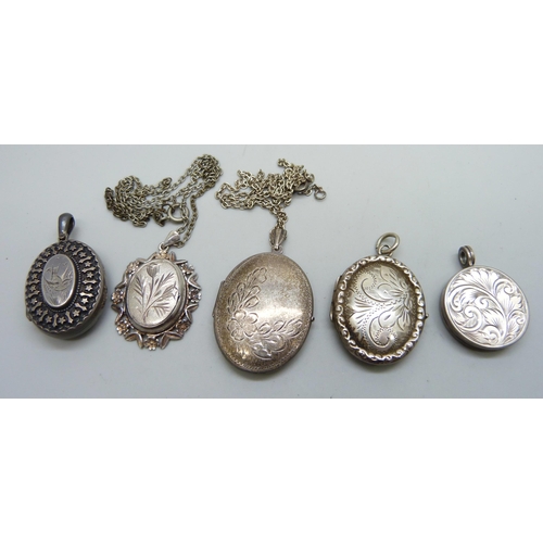 7105 - Five silver lockets including one Victorian