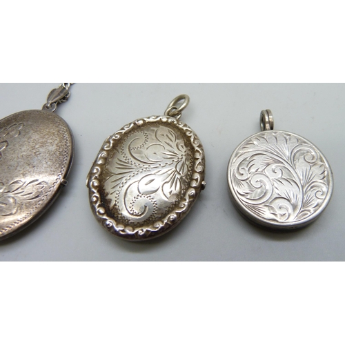 7105 - Five silver lockets including one Victorian