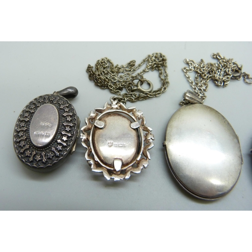 7105 - Five silver lockets including one Victorian