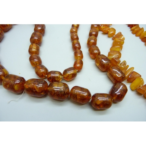 7130 - Two strings of amber beads, 191g