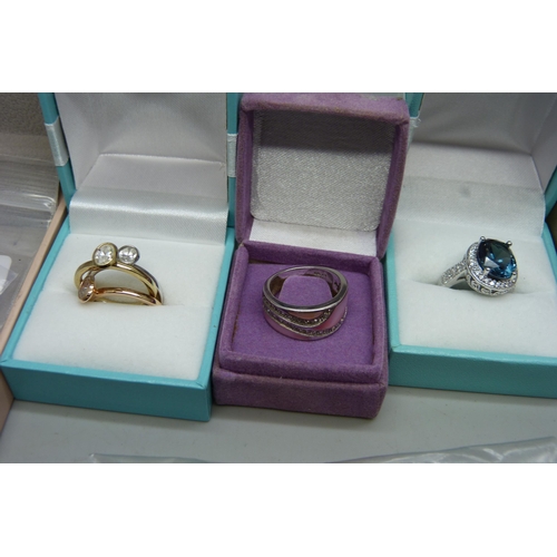 7148 - A large collection of silver rings and other silver jewellery, diamonique set, etc.