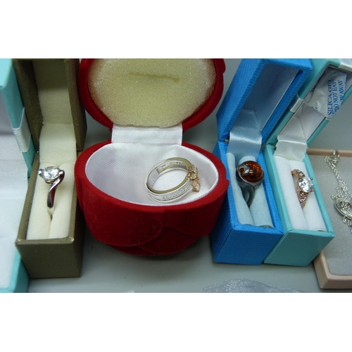 7148 - A large collection of silver rings and other silver jewellery, diamonique set, etc.