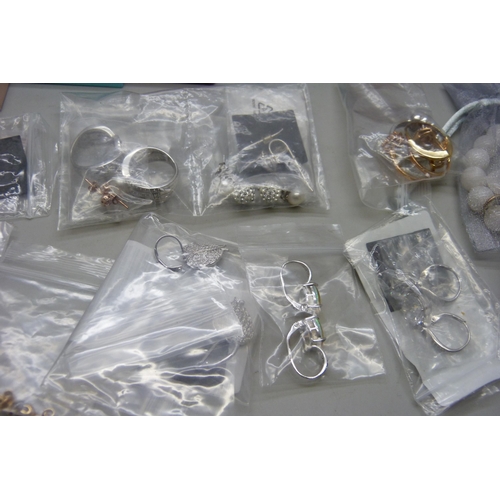 7148 - A large collection of silver rings and other silver jewellery, diamonique set, etc.