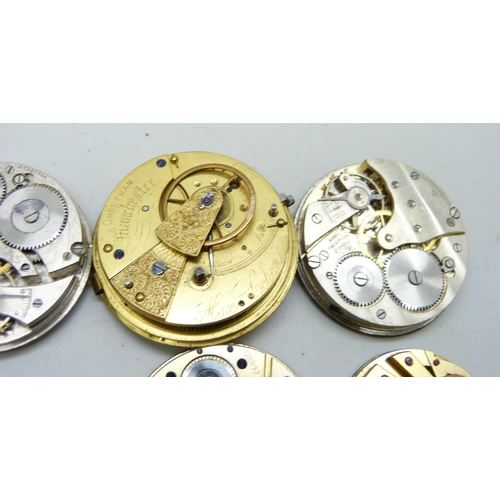 7159 - A collection of pocket watch movements and dials