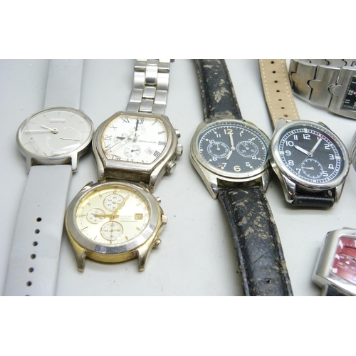 7160 - A collection of lady's and gentleman's wristwatches to include Storm, Swiss Military, Titan Edge, Ci... 