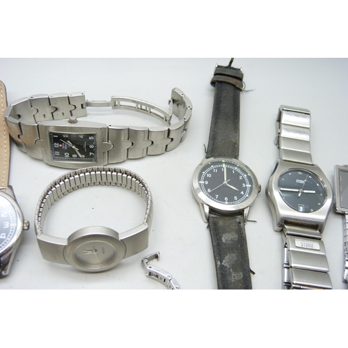 7160 - A collection of lady's and gentleman's wristwatches to include Storm, Swiss Military, Titan Edge, Ci... 