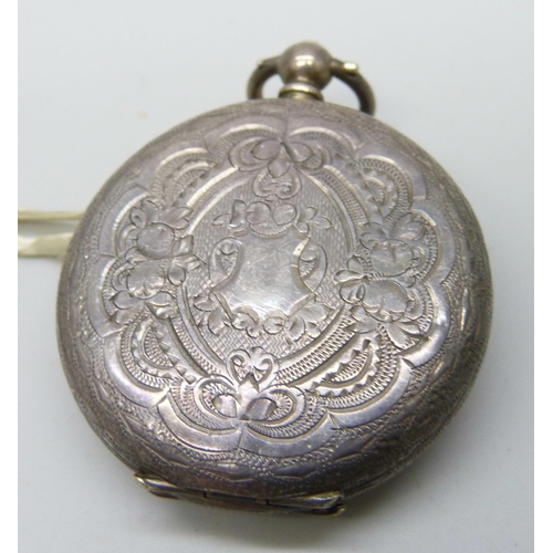 7175 - An 800 silver fob watch with decorative dial