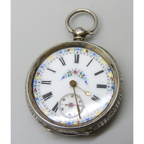 7180 - A silver fob watch and key, lacking glass