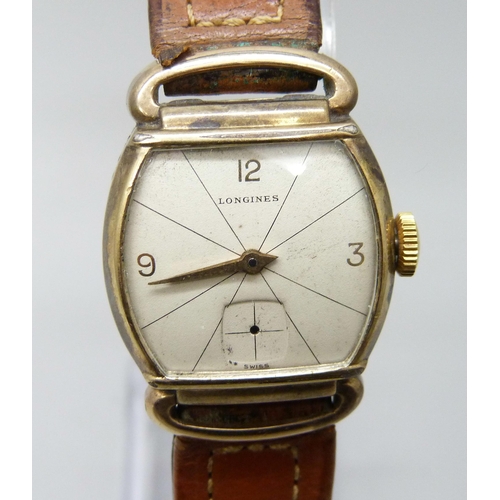 7200 - A 10ct gold filled Longines wristwatch, lacking second hand, 24mm case