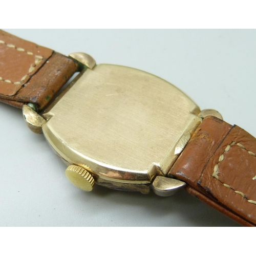 7200 - A 10ct gold filled Longines wristwatch, lacking second hand, 24mm case