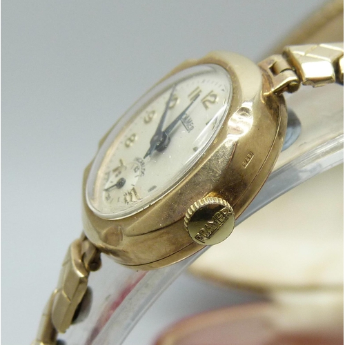 7217 - A 9ct gold lady's wristwatch, Roamer, cased