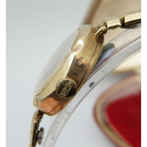 7217 - A 9ct gold lady's wristwatch, Roamer, cased