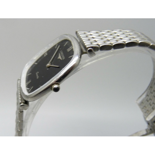 7220 - A Longines quartz wristwatch, glass loose