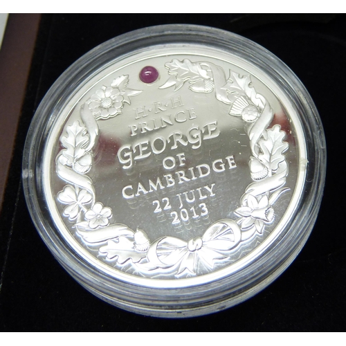 7237 - Two commemorative silver medallions, birth of Prince George