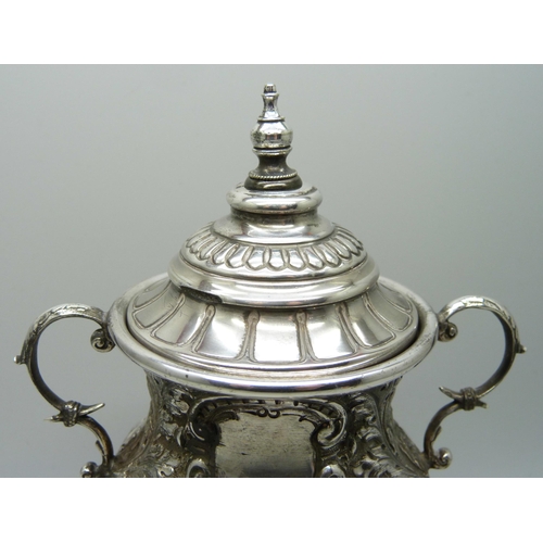 7266 - An embossed silver two handled lidded trophy, Birmingham 1932, 183g, 16.5cm