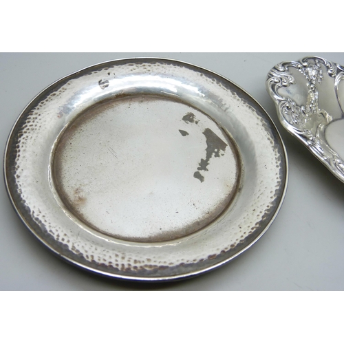 7269 - An embossed silver dish, Birmingham 1908, and a hammered dish marked sterling, 125g