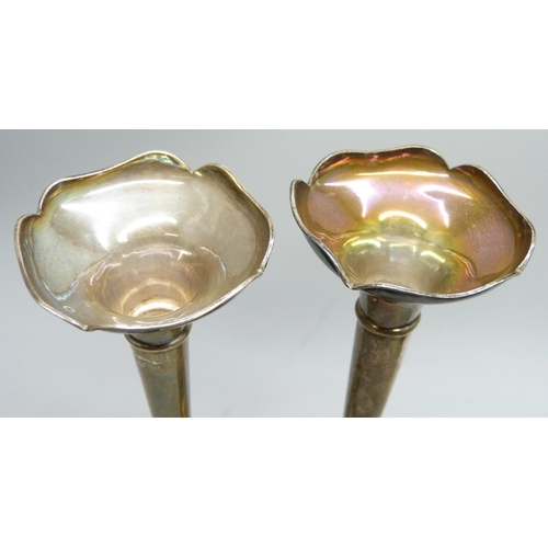 7271 - A silver cream and sugar, a silver salt and a pair of silver vases, total weight 236g, (vases a litt... 