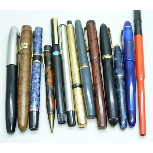 7295 - A collection of pens and one pencil, including Watermans with 18ct gold nib, two with 14ct gold nibs... 