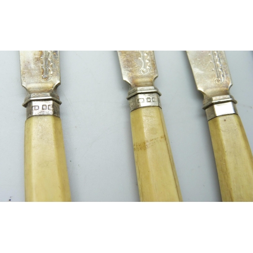 7296 - A set of five fish knives and forks with silver ferrules and handle ends