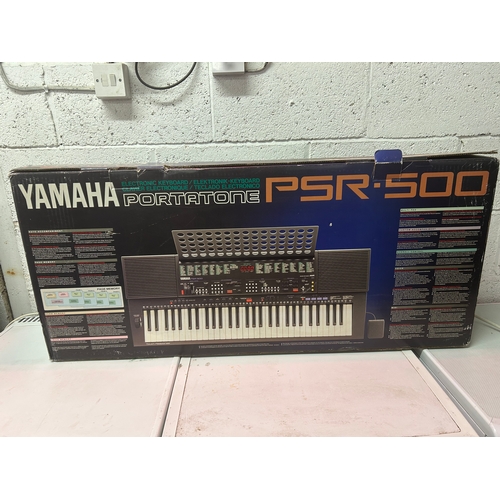 5117A - A Yamaha portatone PSR-500 electric keyboard in box