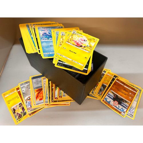 2187 - Over 600 Pokémon cards in collectors box and tin, contains a variety of holographic including rares