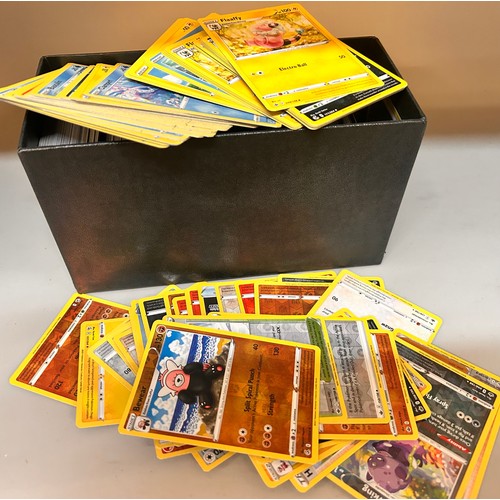 2187 - Over 600 Pokémon cards in collectors box and tin, contains a variety of holographic including rares