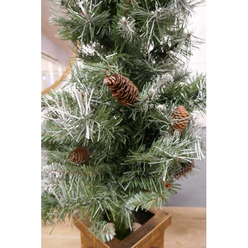 3005 - A 4ft Artificial Christmas tree in a pot