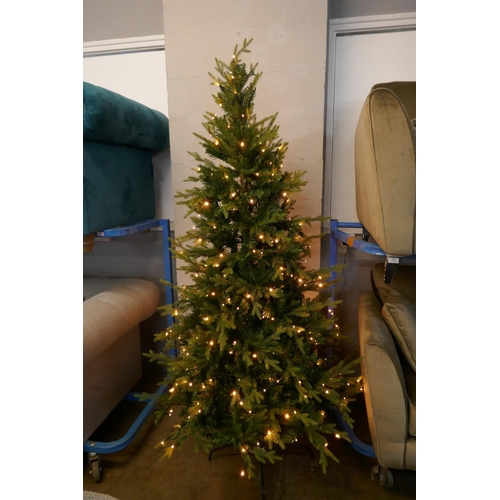 3009 - A 7ft artificial prelit Christmas tree