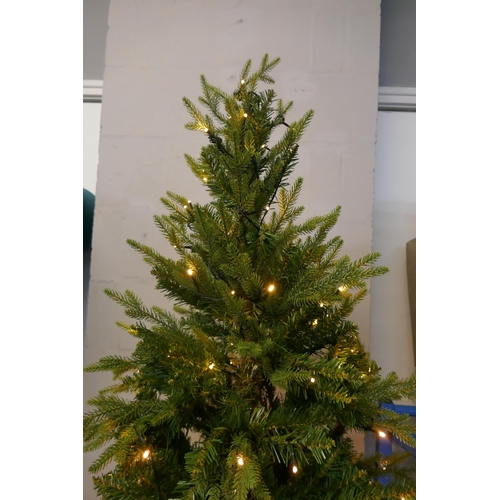 3009 - A 7ft artificial prelit Christmas tree