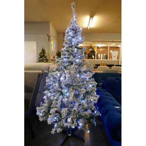 3028 - A 6ft Artificial Prelit Flocked Christmas tree