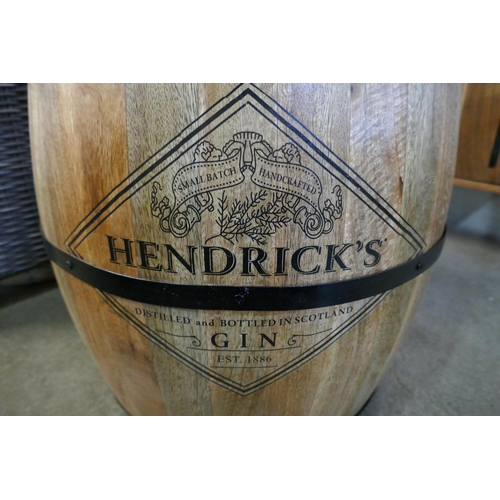 3045 - A mango wood barrel shaped storage stool bearing Hendricks Gin inscription