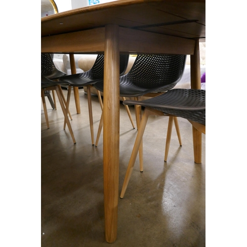 3047 - An oak extending dining table and 6 grey Jonah Trellis plastic dining chairs