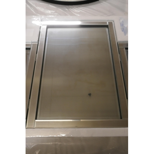 3055 - A tri-fold dressing table mirror