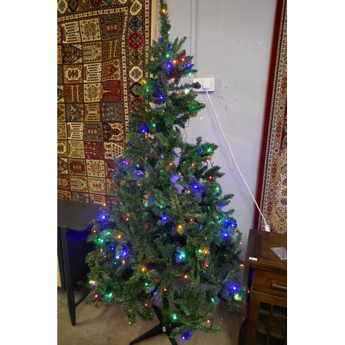 3071 - A 7ft Artificial Prelit Christmas tree