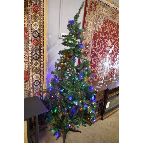 3071 - A 7ft Artificial Prelit Christmas tree