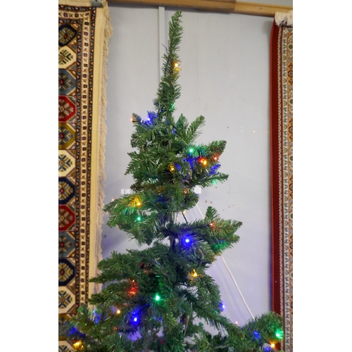 3071 - A 7ft Artificial Prelit Christmas tree