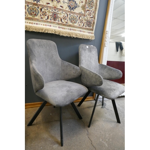 3122 - A pair of Enterprise grey sharkskin effect swivel dining armchairs *This lot is subject to Vat