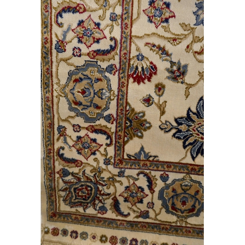 3123 - A gold ground full pule Kashmir rug, all over floral Ziegler design