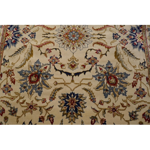 3123 - A gold ground full pule Kashmir rug, all over floral Ziegler design