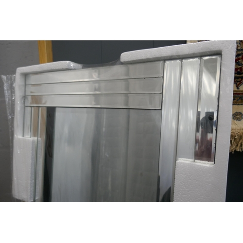 3125 - A bevelled frame mirror, 120cm x 40cm