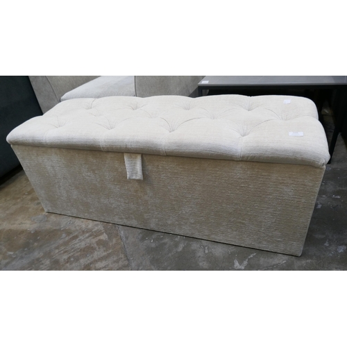 3193 - A cream upholstered storage ottoman