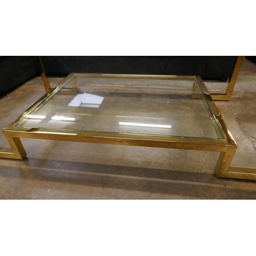 3195 - A Kesterpoint two tier gold effect and glass topped coffee table