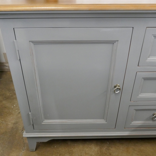 3209 - A grey painted and pine single door, three drawer sideboard