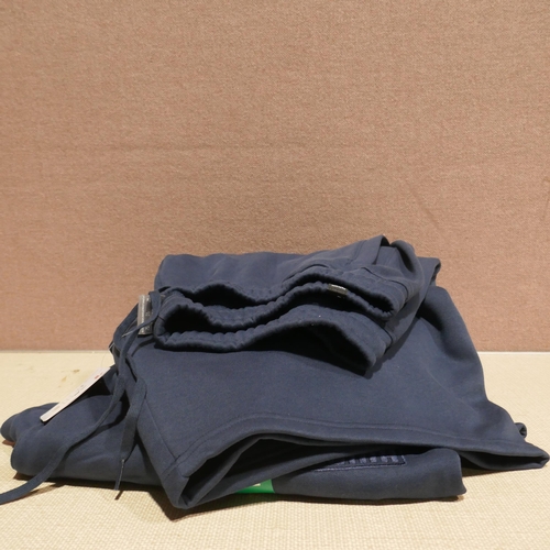 6170 - A large bag of Puma badge navy shorts, mixed sizes (345-764) *This lot is subject to Vat