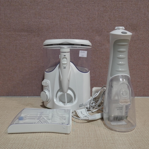 6194 - Waterpik Water Flosser  (345-221) *This lot is subject to Vat