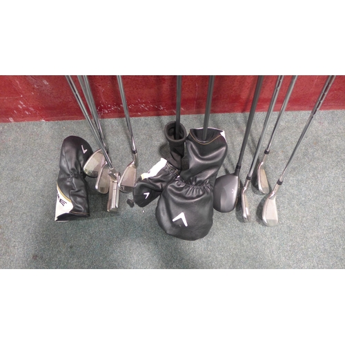 6103 - Nine Callaway Golf clubs and an Odyssey putter  (342-100) *This lot is subject to Vat