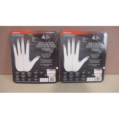 6136 - Two packs of Four medium Kirkland Signature golf gloves (345-737) *This lot is subject to Vat