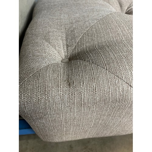 3033 - An oatmeal textured weave upholstered buttoned footstool