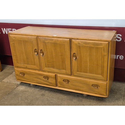 1 - An Ercol Blonde elm Windsor sideboard