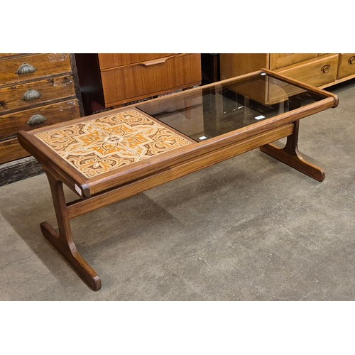 4 - A G-Plan Fresco teak, tiled and glass topped rectangular coffee table